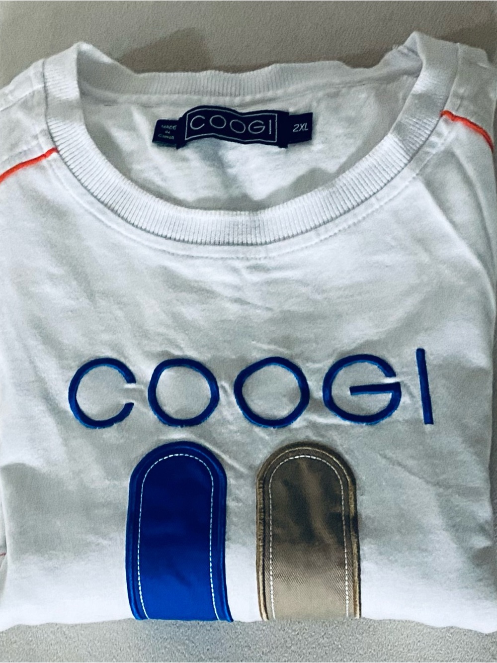 COOGI White Tee with Blue and Gold Logo Accents